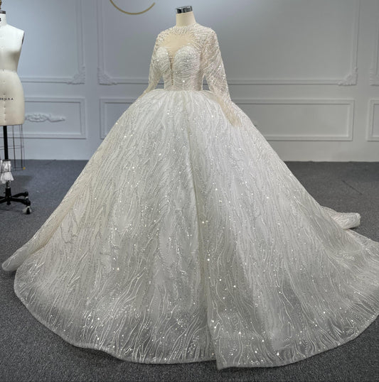 A white long-sleeved high-neck wedding dress with hand-beaded sequins, a large swing, and a long tail